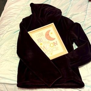 I am selling a black wonder nation sweater and it is vary soft